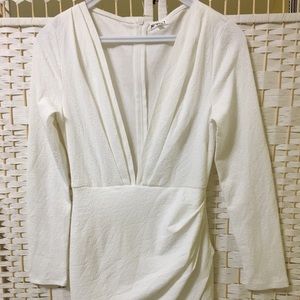PLUNGING NECKLINE WHITE DRESS